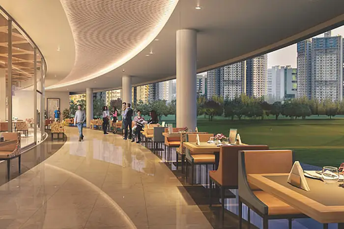 Clubhouse lounge overlooking the greens at Blue Ridge Hinjewadi